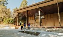 Visitors outside the Kui Kiosk building in Wombeyan Karst Conservation Reserve. Credit: Remy Brand/DPE &copy; Remy Brand