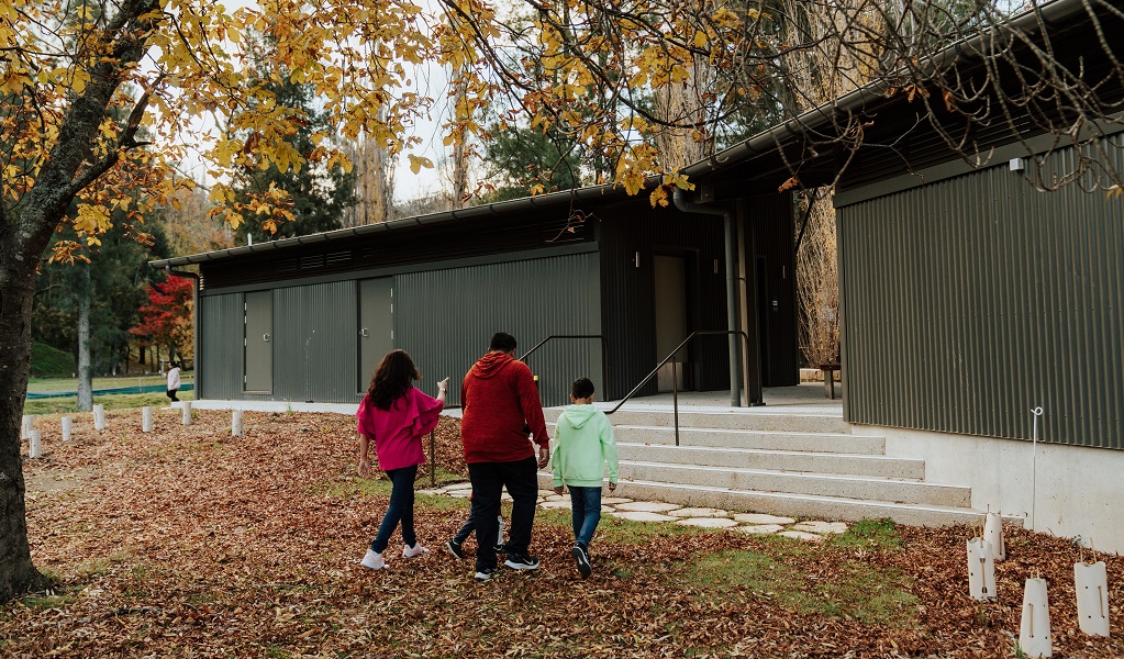 Campers outside the amenities block in Wombeyan Caves campground. Credit: Remy Brand/DPE &copy; Remy Brand