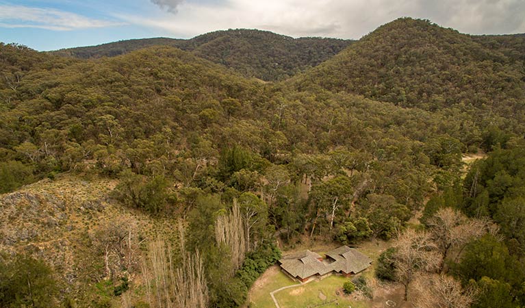 Arial view of Wombeyan Caves dorms set in the bushland hills. Photo: OEH/John Spencer