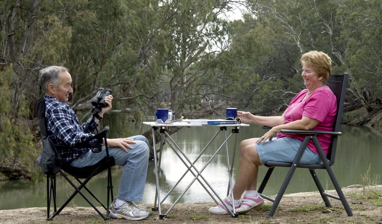 Two grey nomad travellers in Mamanga campground. Photo: Boris Hlavica/NSW Government