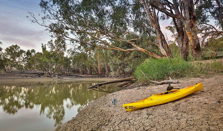 Kayak on riverbank beside the Murrumbidgee River in Yanga National Park. Photo: Vision House Photography/OEH