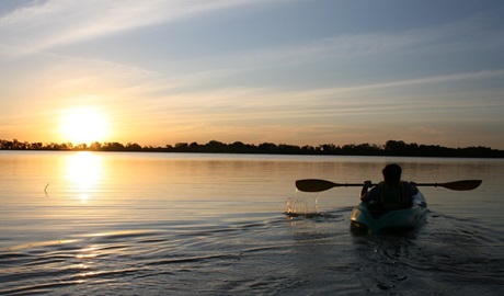 A kayaker on Yanga Lake at sunset, Yanga National Park. Photo: Martin Kendall/OEH