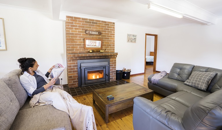 Fire place and lounge room at Big Yango House, Yengo National Park. Photo: Simone Cottrell/OEH