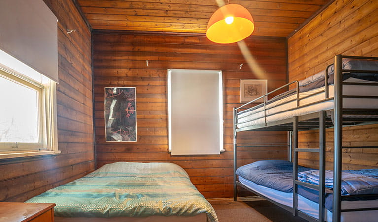 A single bunk bed and double bed in Post Office Lodge, Yerranderie Private Town, Yerranderie Regional Park. Photo: John Spencer/OEH