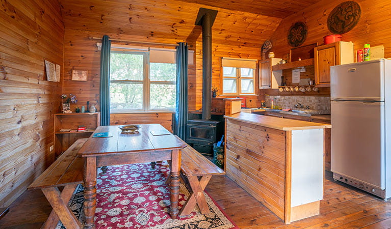 Kitchen and dining area in Slippery Norris Cottage, Yerranderie Regional Park. Photo: John Spencer/OEH