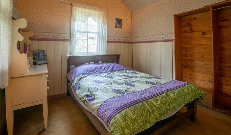 The master bedroom with a double bed at Slippery Norris Cottage in Yerranderie Regional Park. Photo: John Spencer/OEH