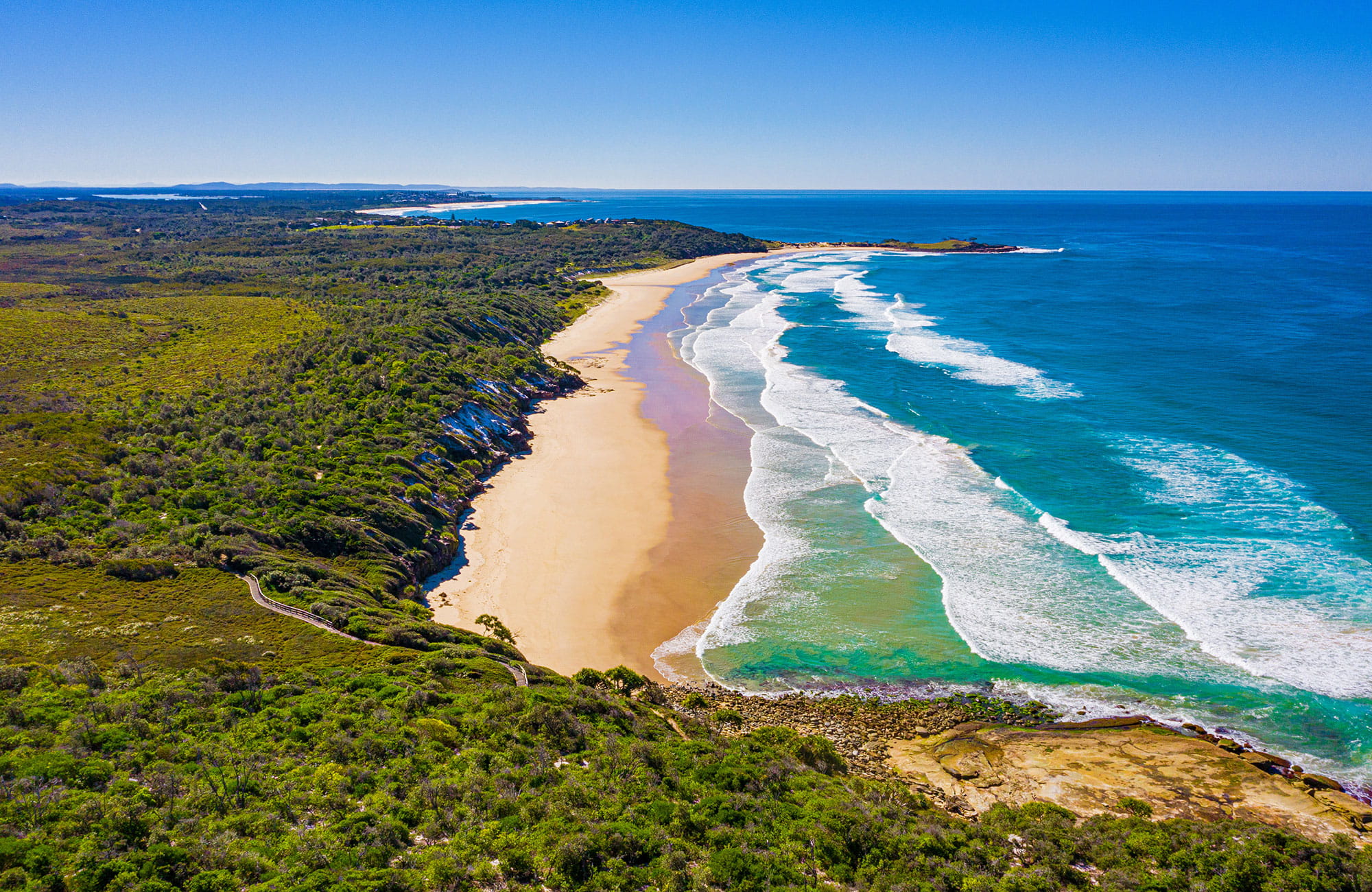 Aerial view of Angourie Bay picnic area and nearby beach in Yuraygir National Park. Photo: Jessica Robertson &copy; DPIE