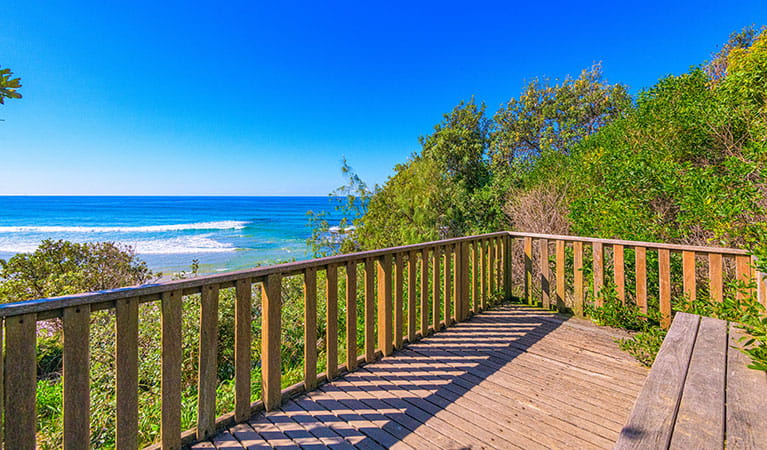 The view of the beach from a deck at Illaroo campground in Yuraygir National Park. Photo: Jessica Robertson &copy; DPIE