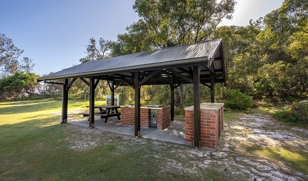 The view of the beach from a deck at Illaroo campground in Yuraygir National Park. Photo: Jessica Robertson &copy; DPIE