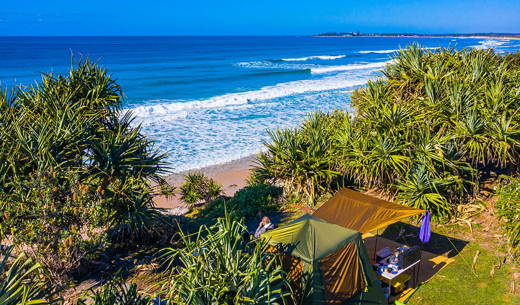 Tent set up for a stay at Red Cliff and Lake Arragon campgrounds, above the beach, Yuraygir coastal walk, Yuraygir National Park. Photo: Jessica Robertson &copy; DPE