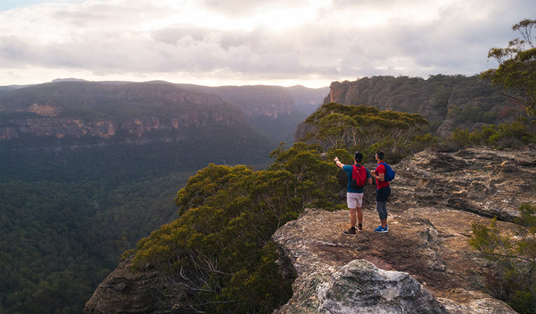 2 walkers on Pagoda lookout walking track in Wollemi National Park. Photo: Daniel Tran/DPIE