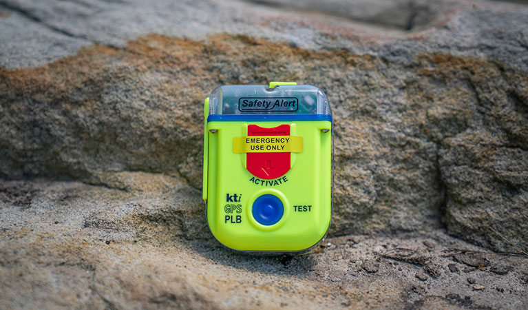 Personal locator beacon (PLB) resting on a rock. Photo: John Spencer/DPIE