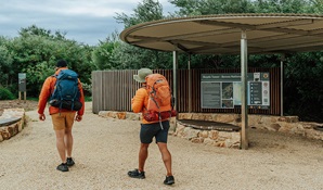 Walkers heading off on a multi-day walk in Beowa National Park. Credit: Remy Brand/DCCEEW