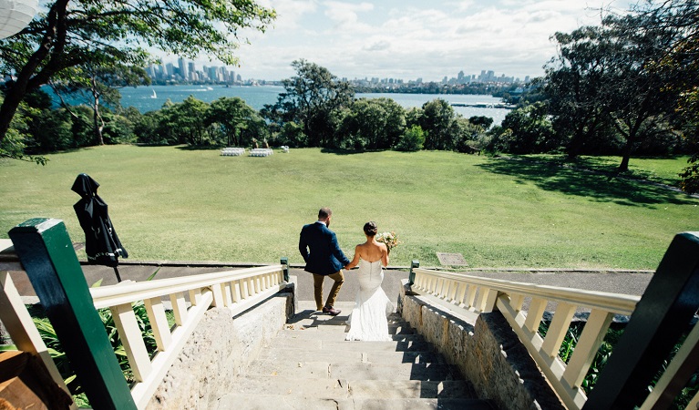 Newlywed couple being photographed at Athol Hall. Photo: Ronny Berg