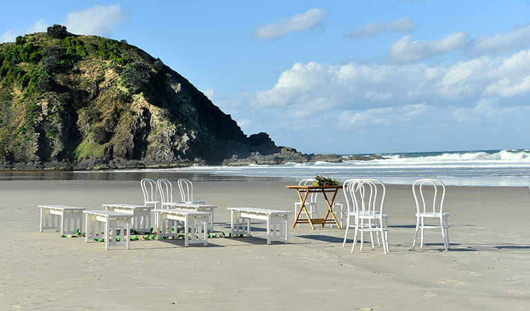 Chairs and benches set up for a wedding at Cosy Corner at Tallow Beach, Cape Byron State Conservation Area. Photo: Fiora Sacco &copy; DPIE