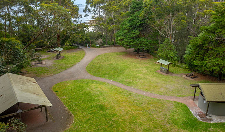 The grassy picnic area at Greenfield Beach with covered shelter, barbecues and picnic tables in Jervis Bay National Park. Photo: John Spencer &copy; DPIE