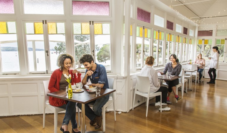 People dining at The Nielsen in Sydney Harbour National Park. Photo: Simone Cottrell &copy; OEH