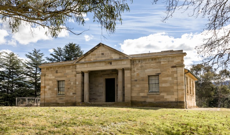 The exterior of Hartley Courthouse framed by trees in Hartley Historic Site. Photo: Jennifer Leahy &copy; DPIE