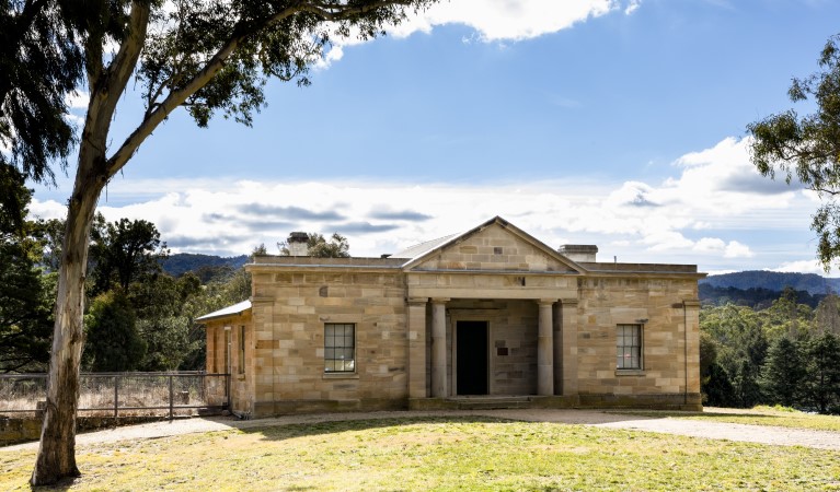 The exterior of Hartley Courthouse, framed by trees in Hartley Historic Site. Photo: Jennifer Leahy &copy; DPIE