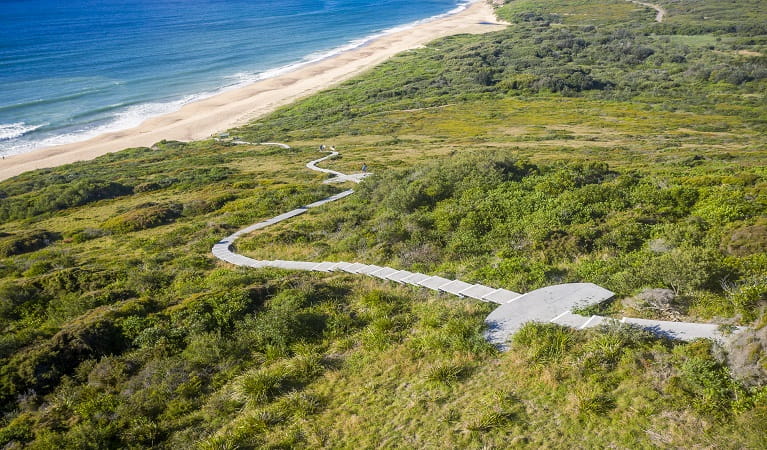 Aerial view of walking track through bushland to a pristine beach near Hickson Street lookout.  Photo credit: John Spencer &copy; DPIE  