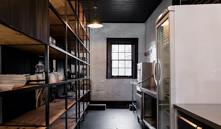 Shelving and the commercial kitchen at Hosies in Hill End Historic Site. Photo:  Jennifer Leahy &copy; DPE