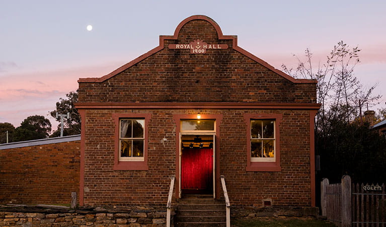 The exterior of Royal Hall at twilight in Hill End Historic Site. Photo: Silversalt Photographty &copy; DPIE