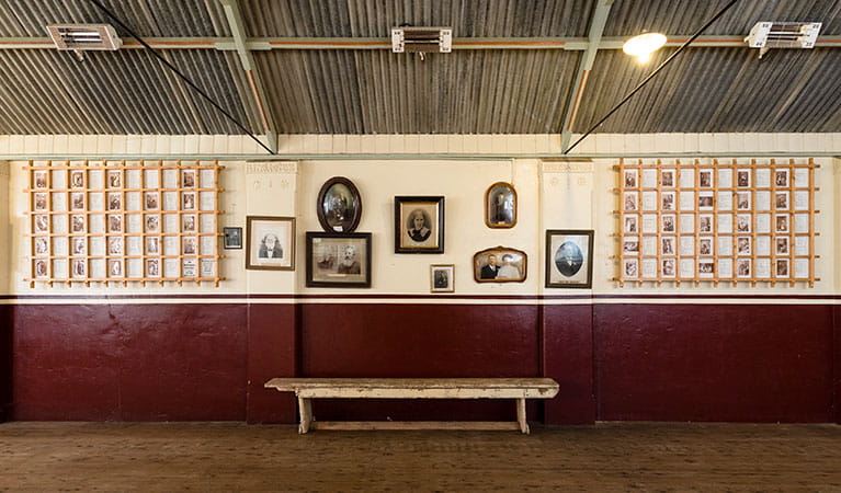Historic photographs on the wall of Royal Hall in Hill End Historic Site. Photo: Jennifer Leahy &copy; DPE
