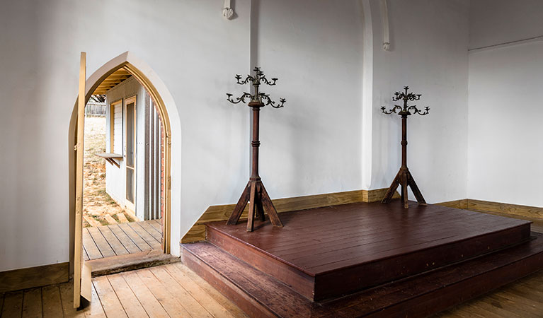 Pulpit and arch doorway in Sacred Heart Church, Hill End Historic Site. Photo: Jennifer Leahy &copy; DPE