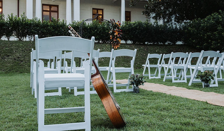 A close-up of chairs and a guitar at Strickland Estate in Sydney Harbour National Park. Photo &copy; Matt Horspool