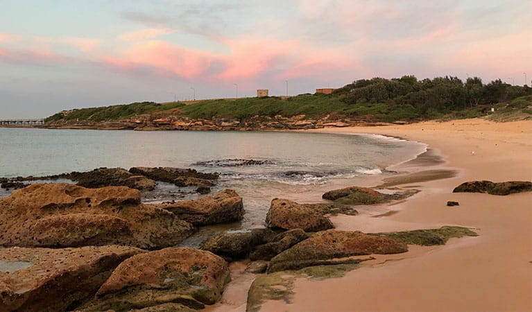 Sunset at Congwong Beach swimming area in the La Perouse area of Kamay Botany Bay National Park. Photo: Stacy Wilson &copy; DPE