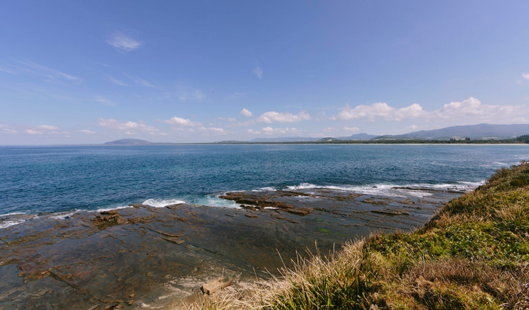 Rocky coastline of Seven Mile Beach National Park. Photo: David Finnegan