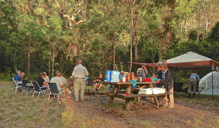 Volunteers enjoying a camp dinner, Marramarra National Park. Photo: Tegan Burton/NPWS